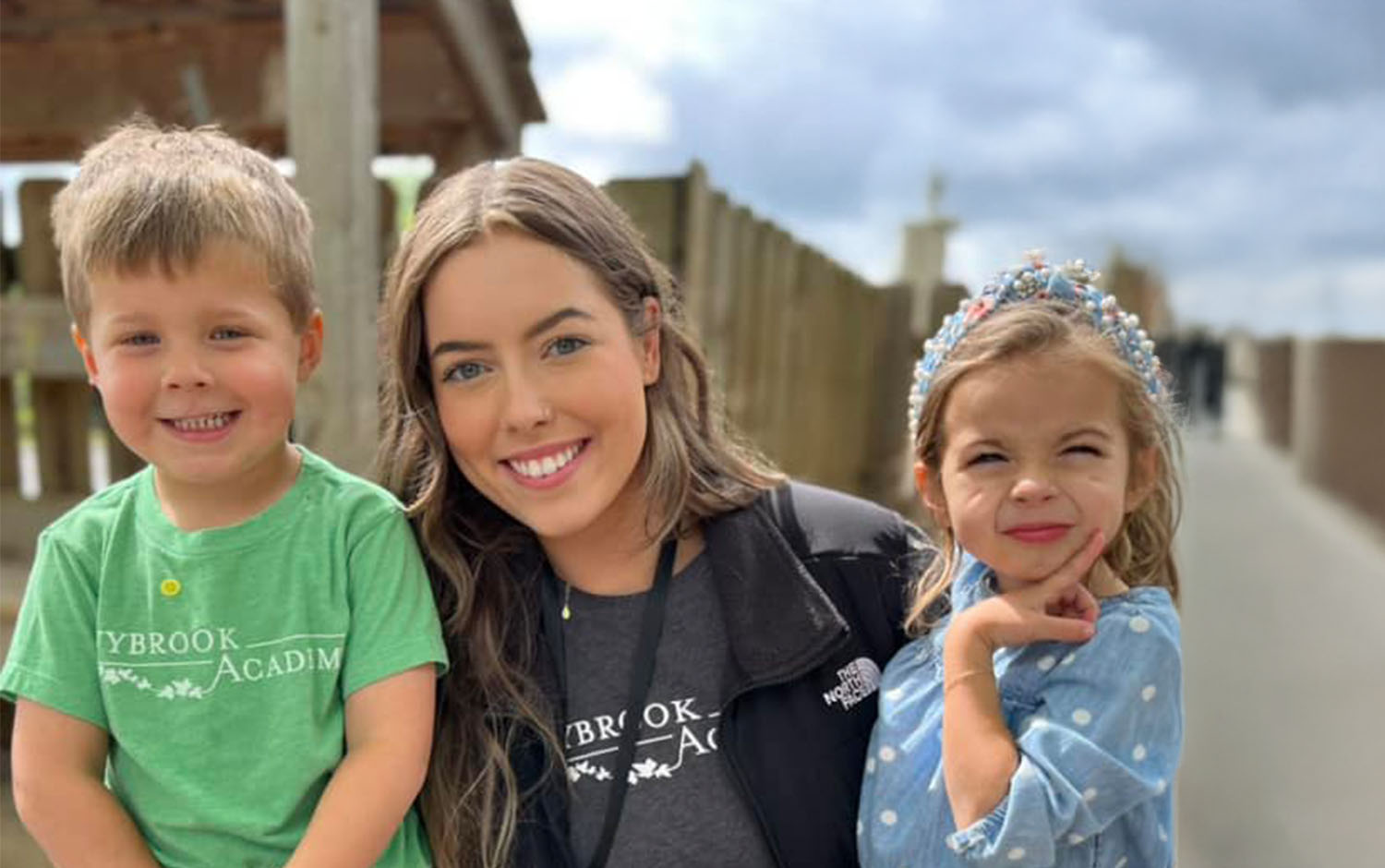 preschool teacher and two children